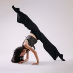 energetic dance pose in studio setting